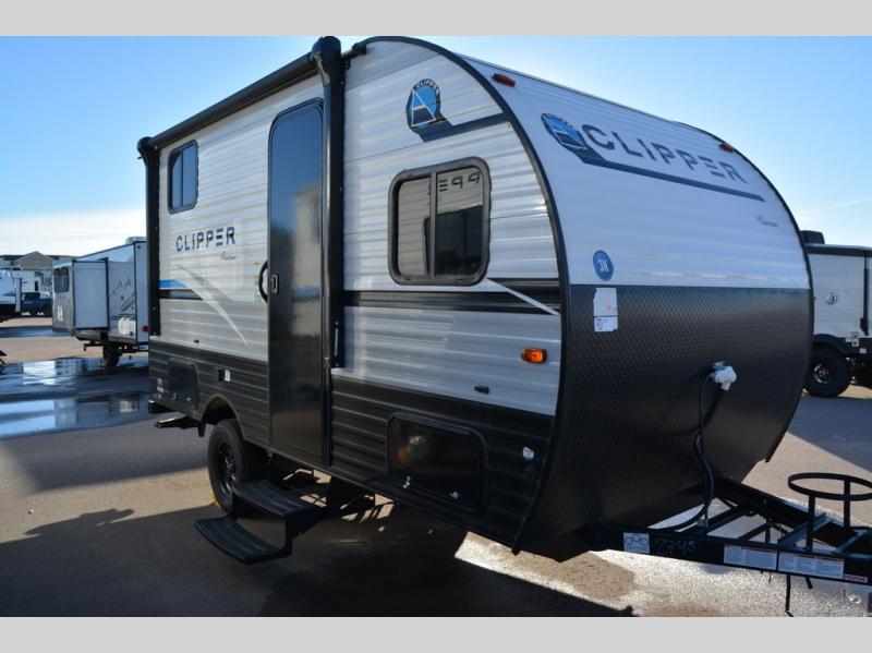 Coachmen RV Clipper Cadet 15CBH travel trailer sitting on the dealer lot